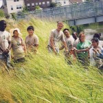 Minneapolis’ seasonal, temporary “green team” Teen Teamworks group works in Heritage Park.