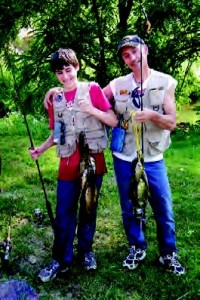 Although some people accuse SWAT teams of overreaction and near-terrorism, other people, like former military member Gary Brown, pictured here fishing with his son, Kaden Brown, beg to differ