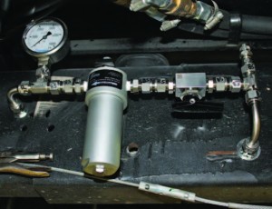 Pictured is a CNG highpressure fuel line with serviceable components Pictured is a CNG highpressure fuel line with serviceable components.