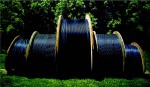 Giant spools of fiber optics await installation in Chattanooga, Tenn. Giant spools of fiber optics await installation in Chattanooga, Tenn.
