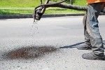 As public works departments struggle to stretch their budgets far enough to be able to patch all of their pothole-plagued streets, in a few instances residents have decided to take matters into their own hands and attempt the repairs on their own. (Shutterstock photo)