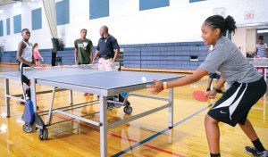 Youth play table tennis during the Teen Lounges that are a part of the Summer Heatwave program at the Martin Luther King Jr. Multipurpose Center in Gainesville. (Photo provided)