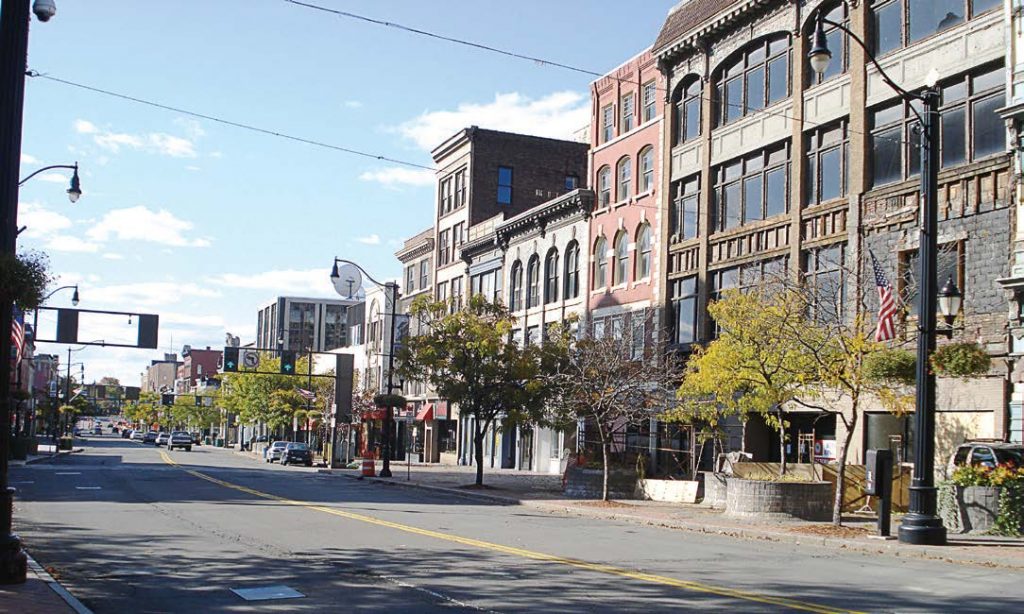 George F. Johnson was a partner in the highly successful Endicott- Johnson Shoe Company, which established the Triple Cities of Binghamton, Johnson City and Endicott in New York. Pictured is downtown Binghamton, which is known as the “Carousel Capital of the World.” (Public domain via Wikimedia Commons)
