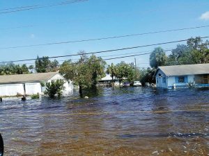 Due to Florida’s low-lying areas, the state is more prone to experience flooding, which in turn can cause sewage overflows when power is knocked out to lift stations. Pictured is damage caused by Hurricane Irma. (Photo provided)