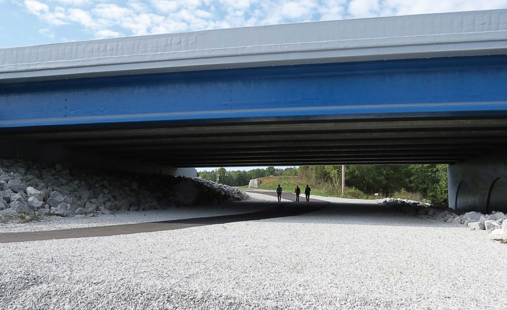 Walkers utilize the trail that runs underneath Harshman Road Bridge. (Photo provided)