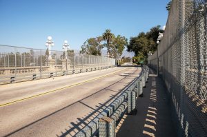 Pasadena, Calif.’s, Colorado Street Bridge, also known as suicide bridge, has been fenced by the city to prevent further deaths. People leave notes tucked in the fence. (Lando Aviles/Shutterstock.com)