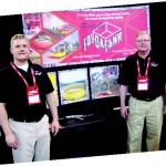 At another exhibit inside Lucas Oil, Chad and Jan Christensen, exhibited the patented, portable Fol-da-tank.