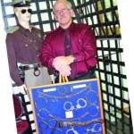 Sheriff David Lain of Porter County, Ind., owns an extensive assortment of police antiquities that includes the handcuffs, come-alongs and leg chains pictured. He’s acquired them over the last 23 years through his own investigation and from friends. (Photo by Dee Dunheim)