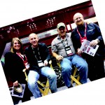 The Municipal Account Executives Christi Sausaman and Steve Gutowski flank, from left, Troy and Jake Landry of the hit television series “Swamp People” at the Ferrara Fire exhibit.