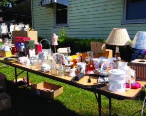 garage sales Community leaders can help foster an attitude for reuse by paving the way for residents to sell their goods at yard sales.