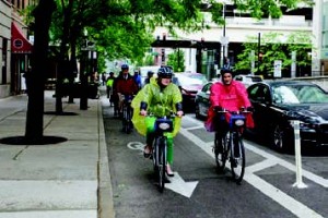 Bicyclists take to the Kinzie Street green lane in Chicago