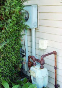 replacing old water meters Replacing old equipment, like water meters, with new, more precise and labor-saving units