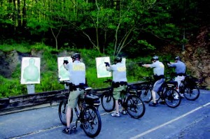 target practice on a bike Hot Springs National Park bike patrol rangers practice handling themselves and their bicycles in a variety of different situations