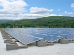Rooftop systems, such as those used by the Green Mountain Coffee Roasters, also provide a viable option for municipalities, using space that would otherwise go untapped. (Provided by groSolar)