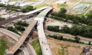 In Illinois, construction workers, utility crews and archeologists worked side-by-side to finish concurrent projects related to construction of a new bridge over the Mississippi River. A team was formed to ensure that the unusual circumstance created as few problems as possible. (Photo provided)