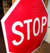 Russellville, Ark., makes all its own signs using high-quality sheeting that is high intensity. Pictured is a newly made stop sign that is compliant with new federal requirements.