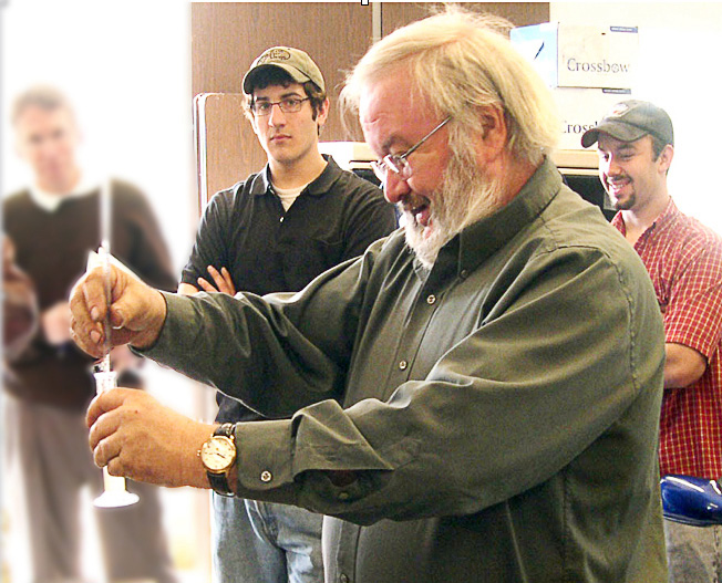One method of testing biodiesel fuel is the 3/27 test, which gauges the quantity of glycerides — unconverted feedstock — that might be present in the fuel. The photo shows Wilson Community College professor Rich Cregar checking a sample for his biofuel technology students. (Photo provided)