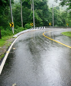 On a rainy day with a wet road, total stopping distance can increase to as much as 510 feet for a vehicle traveling at 55 mph. That’s likely to be more distance than you have at your disposal. (Shutterstock photo)