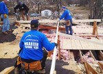 Hope Force volunteers Phillip Vork, foreground, and from left, Anthony Shows, Joey Stoltzfus and Tom Wilson repair a roof damaged by the tornado that struck Brookport. (Photo provided by Hope Force)