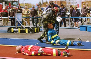 Thomas Gies, Merrick fdny, competes in the Scott Firefighter Combat Challenger at fdic 2013. The next round of competition takes place Wednesday, April 9, through Sunday, April 13, at the annual conference in Indianapolis, Ind. (Photo by Jodi Magallanes)