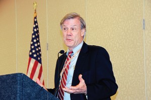 Economist Jim Glassman of JPMorgan Chase gives a presentation, “Economic Outlook, The Global Pulse Quickens,” during LAMP Inc.’s annual meeting. (Photo provided)