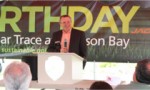 Jacobsen President David Withers speaks to attendees of the Earth Day event at The Bear Trace at Harrison Bay.