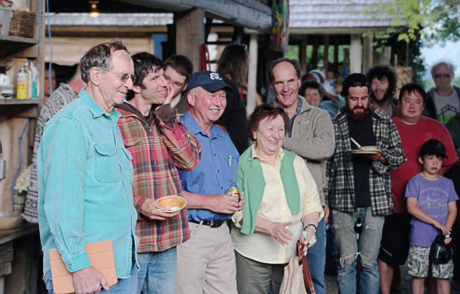 Residents gather to celebrate the near-completion of their town’s new community center. (Photo provided)