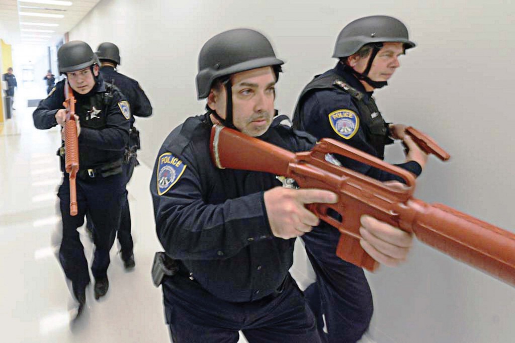 Officers conduct an active shooter response drill at Moraine Valley Community College in Illinois. Over the years school shootings have been committed by individuals who cross age, race, gender and economic boundaries, so developing the relationships that render information on individuals with violent indicators is the most successful tactic for heading off such incidents. (Photo provided)