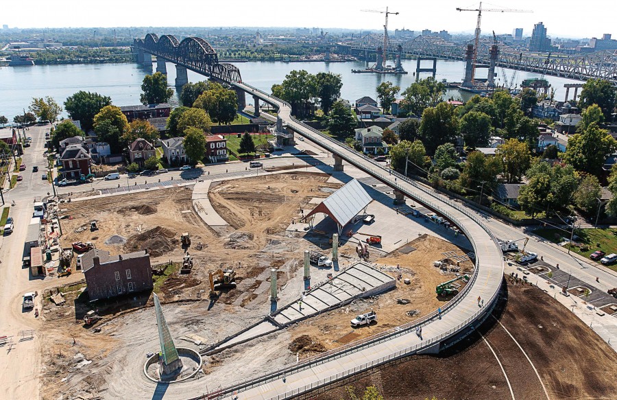 Looking south from the Big Four Station in Jeffersonville, Ind., that was under construction earlier this year, the Big Four Bridge walkway over the Ohio River is visible. In the background is the city of Louisville and construction cranes that are building the northbound I-65 bridge nearby. (Photo provided by hntb Corporation)