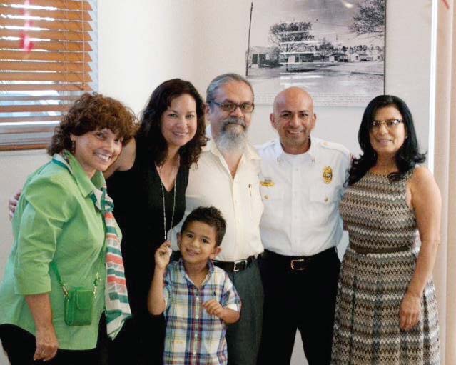 The son of former Florida migrant workers, Lara, second from right, learned the hard way the value of hard work and an education.