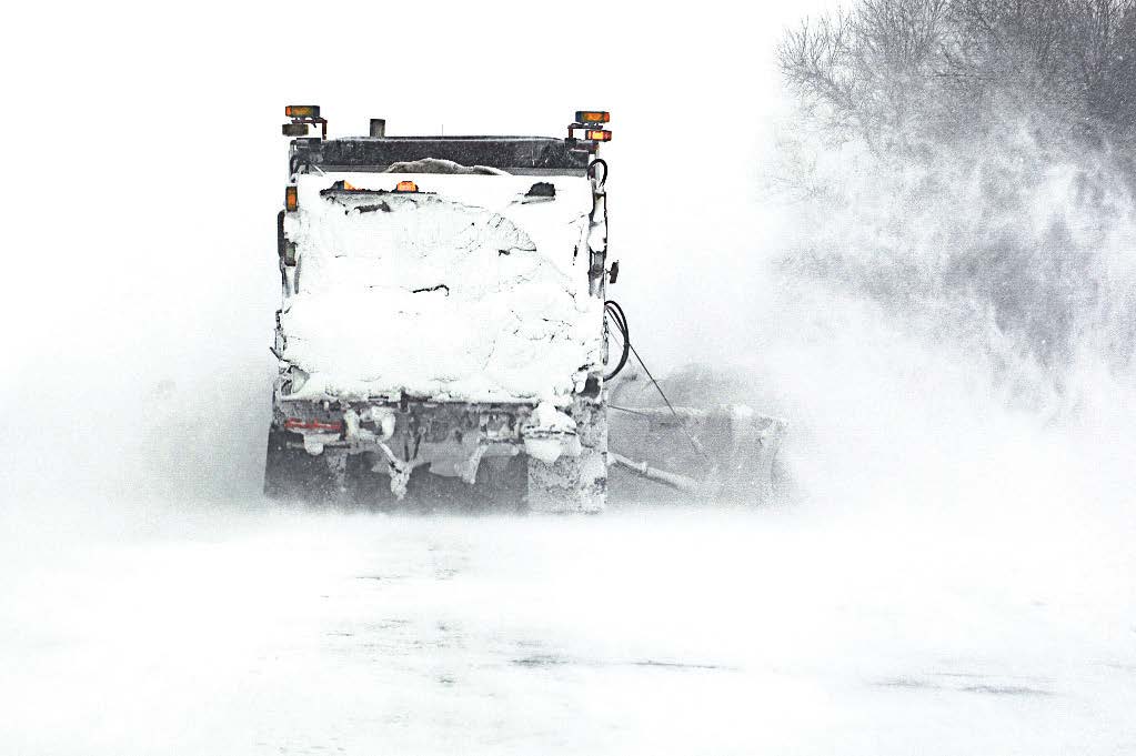 Severe winter storm events mean limited visibility and poor driving conditions, making motorists on the roadway a dangerous combination that can impede recovery efforts. Above, a Minnesota Department of Transportation snowplow truck works to clear a road