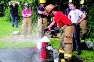 Fire service training programs also attract female would-be firefighters. Some of his most enthusiastic youth program members are girls, said fasny Youth Committee Chairman Jerry Presta. (Photo provided)