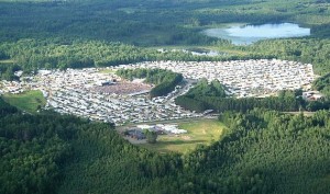 The former county fairgrounds just north of Rhinelander are jammed with more than 50,000 visitors during the nine-day Hodag Country Festival, held each July. Millions of dollars pour into the community and the surrounding area during the event, which centers around a disproved legend. (Photo provided)