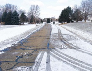 A local subdivision that was anti-iced in one lane prior to a minor winter event, using a blend produced in-house. (Photo provided)