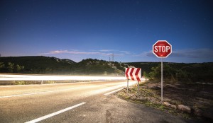 Signs should be detectable and legible at a distance during both the day and at night and remain unobscured by foliage.