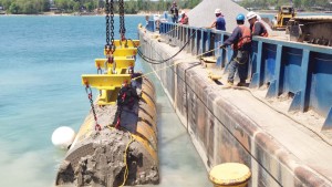 The tunnel boring machine, or TBM, is lifted out of Lake Huron after 1.5 miles of dredging is completed. (Photo provided)