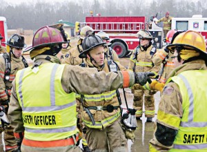 Participants in a KTF burn discuss at length the science behind fire behavior and how adjusting their responses to the details of a fireground situation might control it more effectively. 