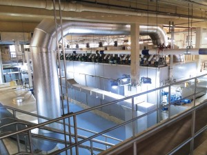 A biosolids dryer is used to evaporate water from wastewater solids. The dried product can then be sold and used as fertilizer.