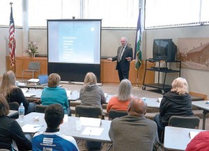 Both members of law enforcement and private-industry employees in gateway positions can protect others and de-escalate dangerous situations by recognizing indicators of extreme stress in an individual. Here, Zalud reviews some of those indicators during a seminar presentation. (Photo provided)