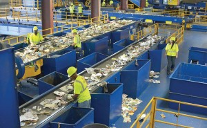 Workers in a material recovery facility keep their eyes on the recycled material going through the automation process to make sure no contaminated material gets through. (Photo courtesy National Waste and Recycling Association)