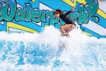 A patron enjoys FlowRider, a simulated surf machine at the Carmel Clay Parks