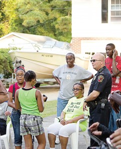 Lt. Mark Von Behren, New Bern, N.C., interacts with members of the North Hills community. Members of the public may be able to add data or other information relevant to the DDACTS model, promote the initiative and can express their reaction to the increase in enforcement. This support encourages the use of DDACTS as a strategy to improve the quality of life in neighborhoods that suffer from high crash and crime rates. (Photo provided)