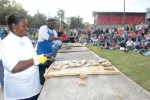 Contestants compete during an oyster shucking contest, one of the highlights of the festival. The winner, considered the state champion, goes on to national competition with hopes of competing in the world championship in Galway, Ireland.