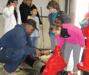 Children seemed to think that the Lake in the Hills, Ill., Public Works Open House was a bucket of fun. (Photo provided)