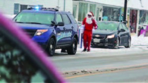 Officer Scott VanSolkema was tasked with not only giving gifts but also extracting what people wanted for Christmas