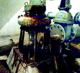 In this specific example of condition assessment, a 2-inch by 6-inch board holds up a pump at a dry shaft station in a very wet environment that has caused rapid corrosion. (Photo provided)