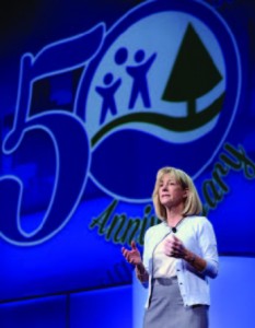New Chairman of the Board of Directors Susan Trautman, CPRP, of Great Rivers Greenway District, St. Louis, Mo., greets attendees at the 50th anniversary National Recreation and Park Association Conference. (Photo courtesy Caught in the Moment Photography