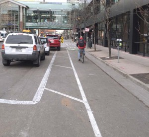 Bike lanes that are shared with motorized transportation lanes are often plowed to the curb whenever there is snow accumulation