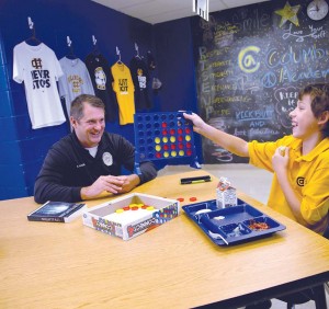 Chief Nadeau and his Little Brother, Connor, oft en indulge in friendly rivalry when playing games.