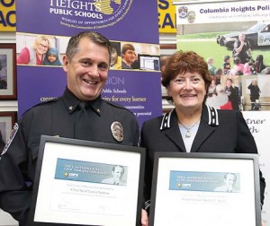 Heights Chief of Police, and Kathy Kelly, Columbia Heights, Mo., superintendent of schools, receive the 2015 L. Anthony Sutin Civic Imagination Award